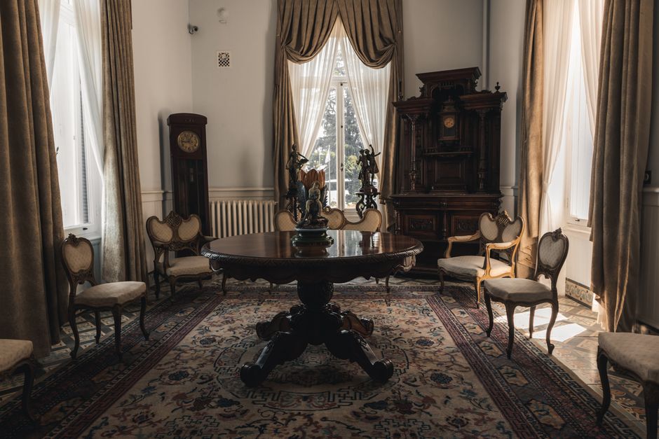 Luxurious vintage dining room with elegant wooden furniture and classic decor in Trabzon, Turkey.